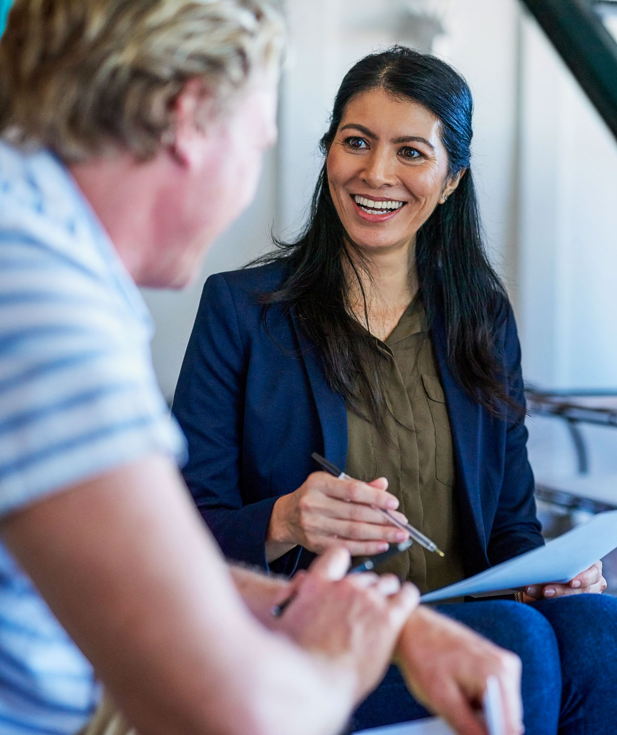 Client speaking the injury lawyer legal team.